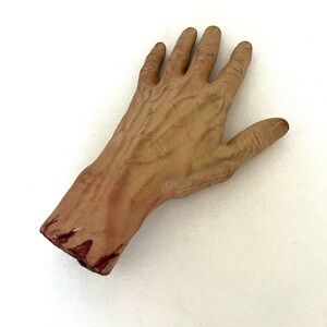 Realistic looking severed hand prop.